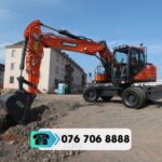 MÁY XÚC BÁNH LỐP DOOSAN DX140W