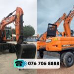 MÁY XÚC BÁNH LỐP DOOSAN DX140W
