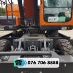 MÁY XÚC BÁNH LỐP DOOSAN DX140W