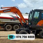 MÁY XÚC BÁNH LỐP DOOSAN DX55W