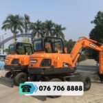 MÁY XÚC BÁNH LỐP DOOSAN DX55W