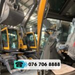 MÁY XÚC ĐÀO BÁNH LỐP VOLVO EW145B