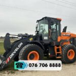 máy xúc lật bánh lốp Develon DL250