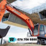 Máy đào bánh lốp DEVELON DX210WA