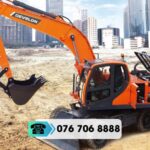 Máy đào bánh lốp DEVELON DX210WA