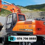 Máy đào bánh lốp DEVELON DX210WA