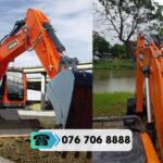 Máy đào bánh lốp DEVELON DX210WA